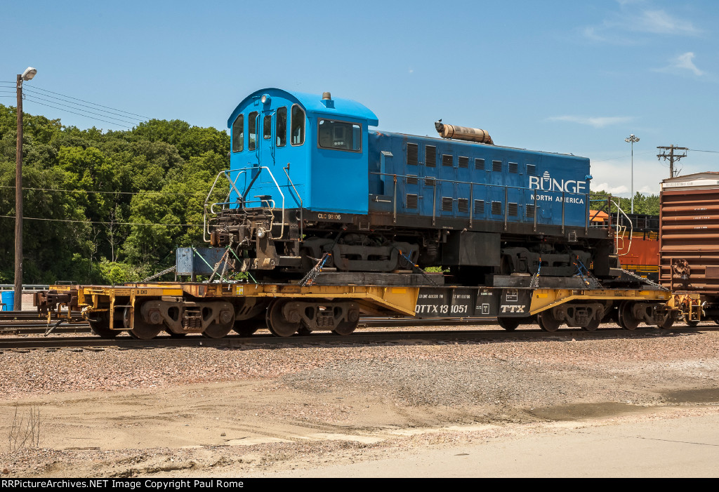 CLC 98106, ALCO S4, was working as BNGX 1039, ex SAL 1484 at the Bunge Processing plant in Council Bluffs Iowa, seen here loaded for delivery on QTTX 131051 8-axle HD Flat Car at BNSFs Gibson Yard